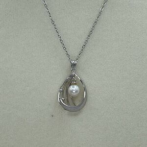 Silver pendant with dangle pearl. Stainless steel chain